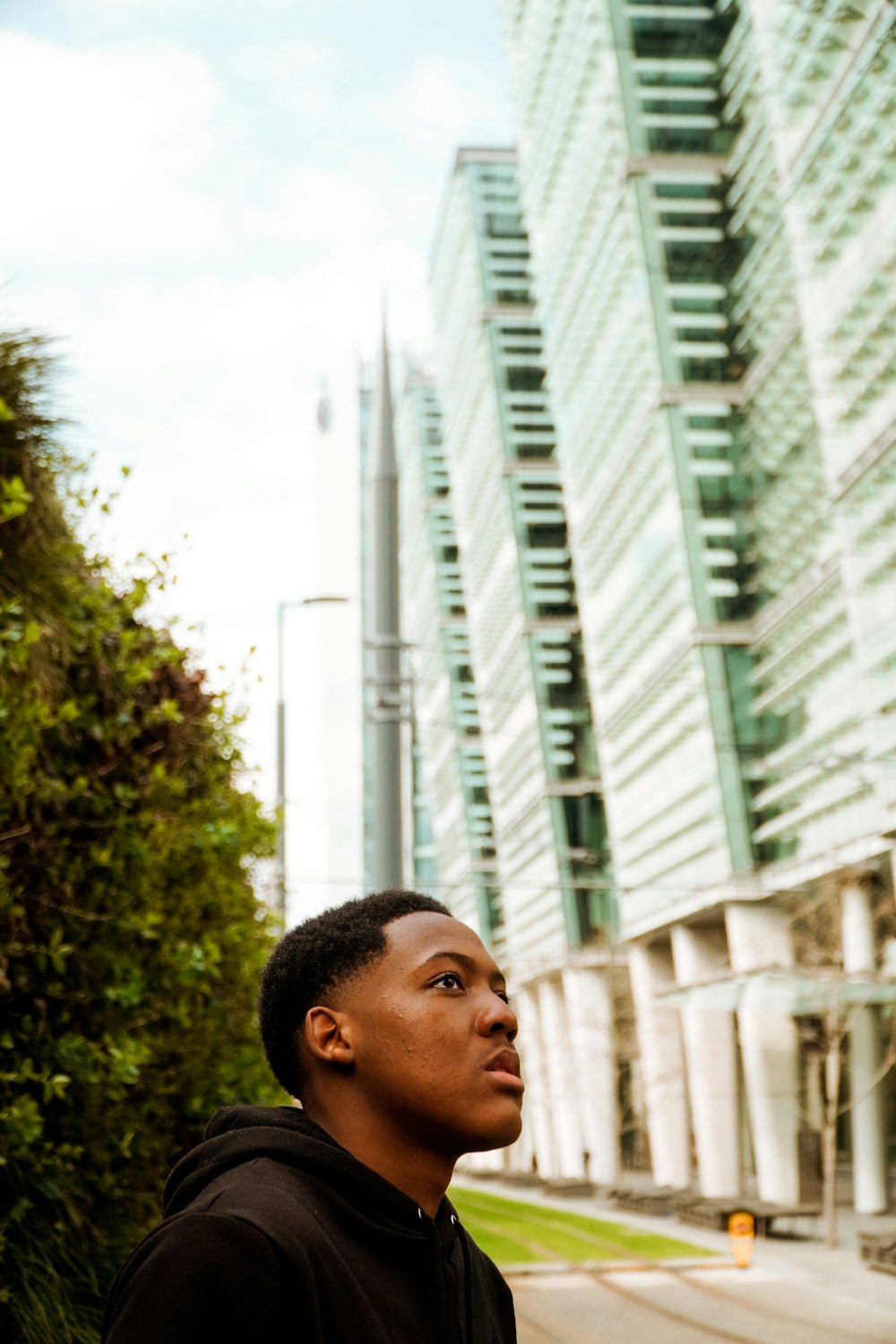 a man standing in front of a building