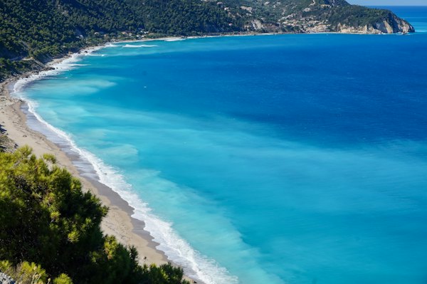 A beach with blue water — Lefkada, Greece