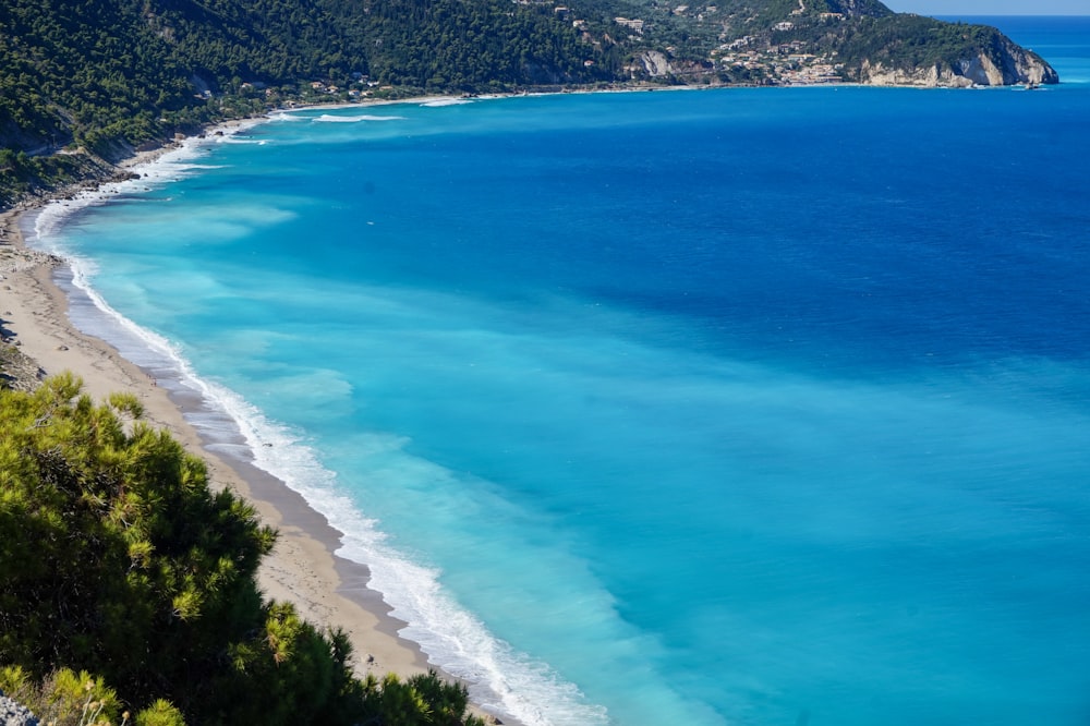 a beach with blue water