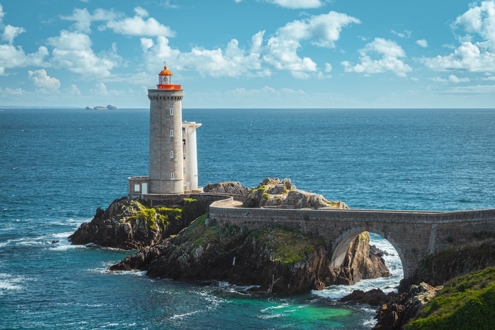 a lighthouse on a rocky island