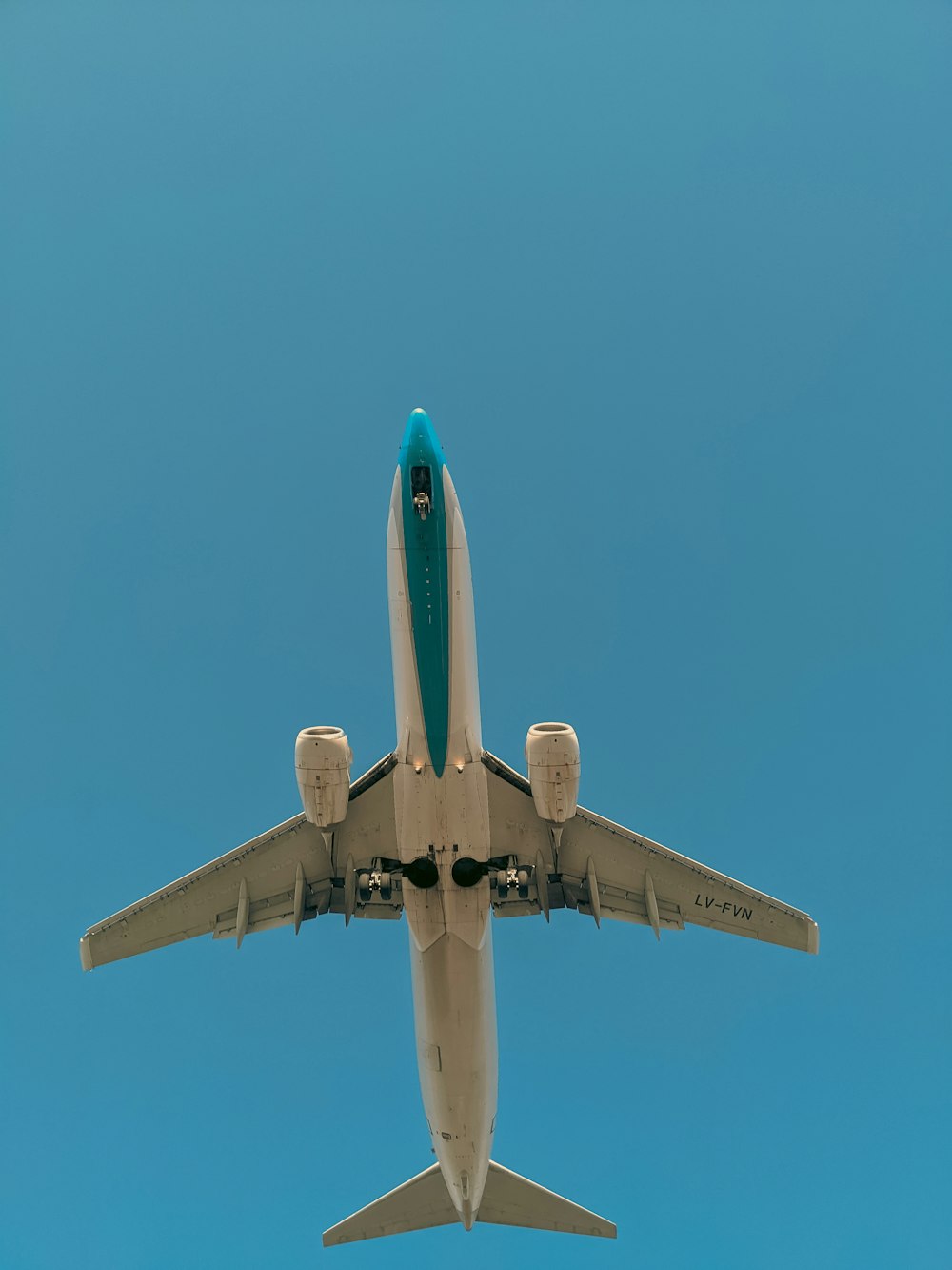 a large airplane flying in the sky