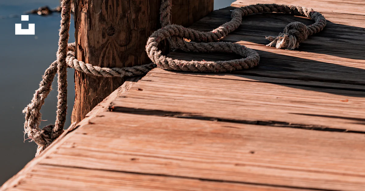 Docks With Ropes A rope on a wooden dock photo – Free Fall Image on Unsplash