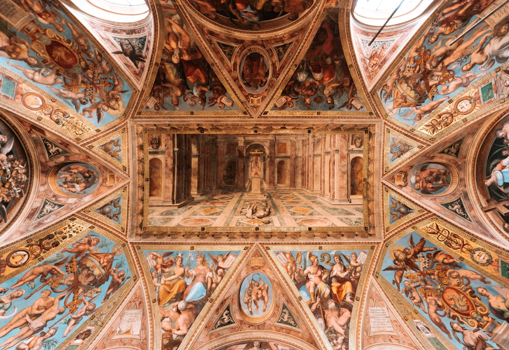 a ceiling with paintings