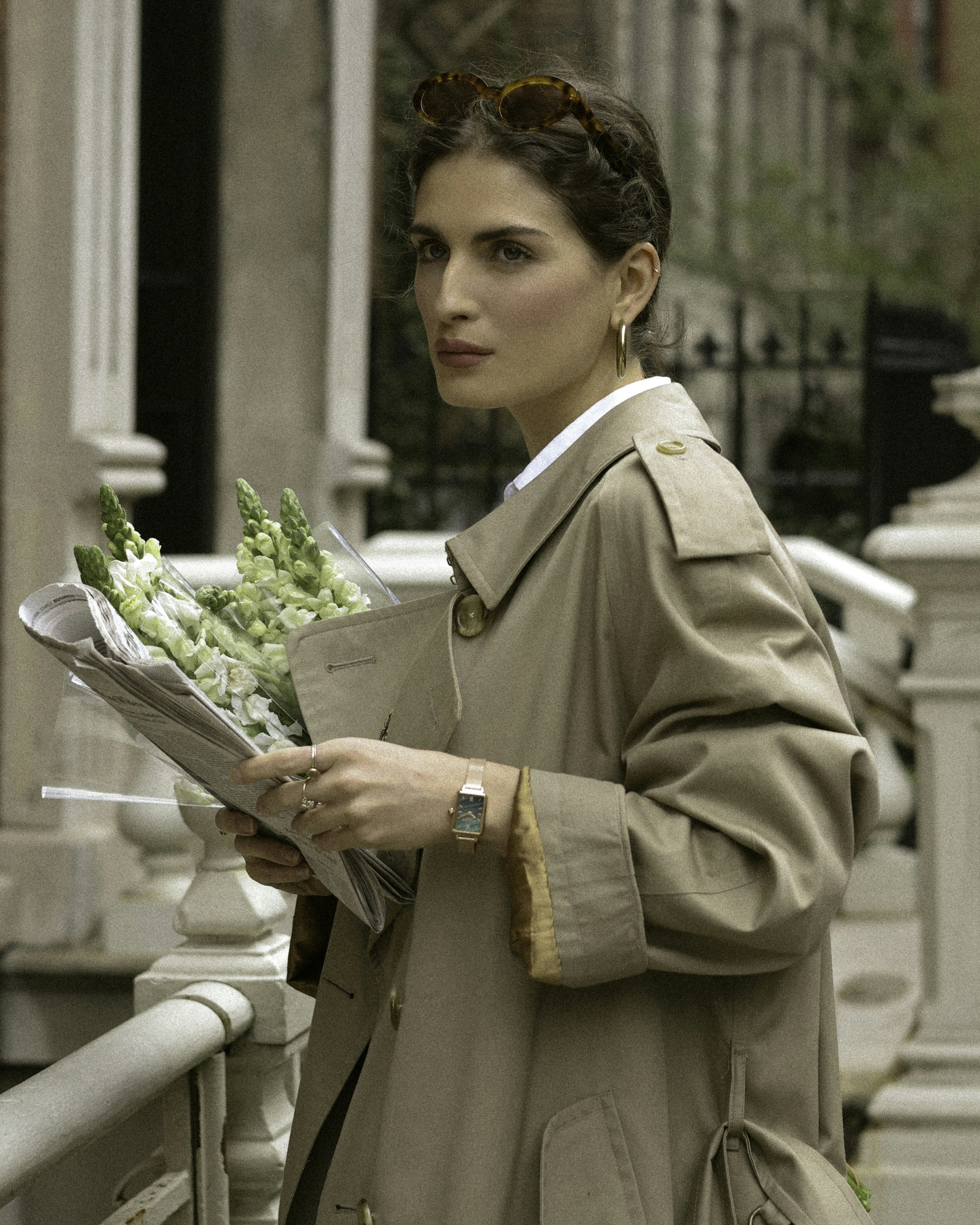 a person holding a bouquet of flowers