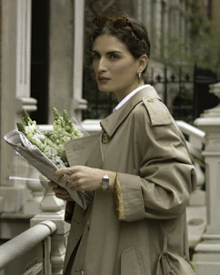 a person holding a bouquet of flowers