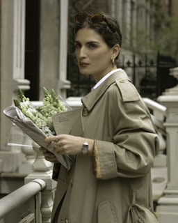 a person holding a bouquet of flowers