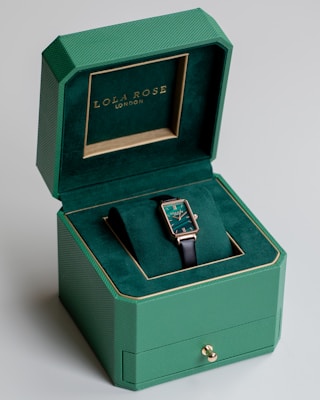 a green box with a black belt