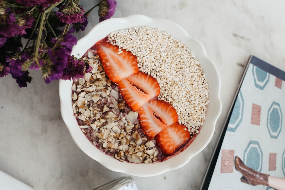 a bowl of rice with strawberries