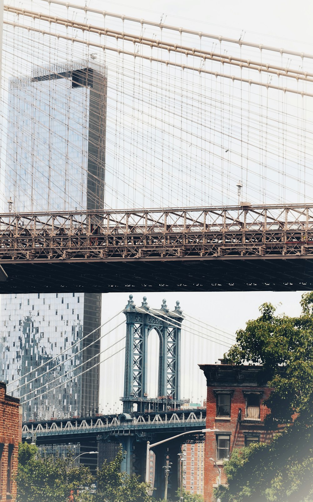 a bridge with a building in the background