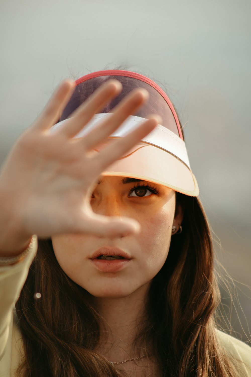 a woman holding a red heart