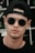 a person wearing sunglasses and a hat