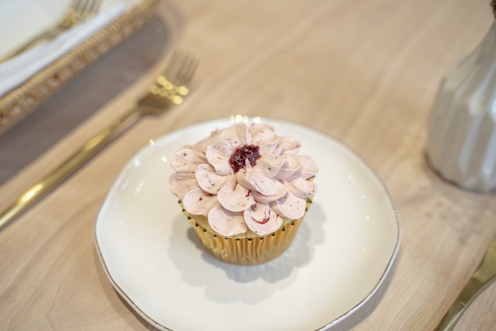 a cupcake with a flower design