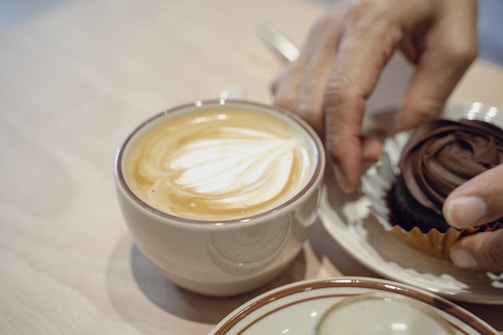 A customer enjoying a freshly made mocha.