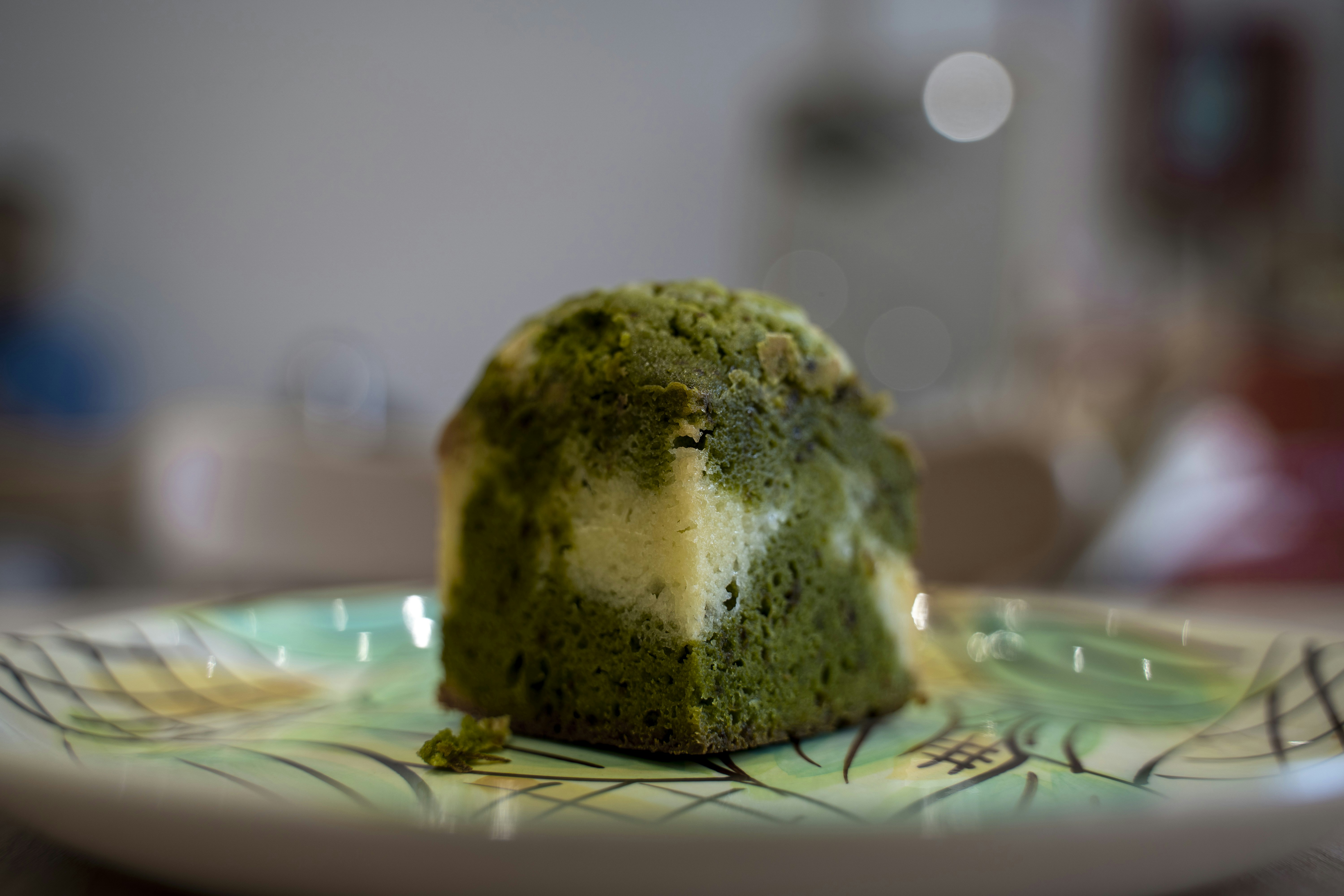Slice of matcha cake on a plate