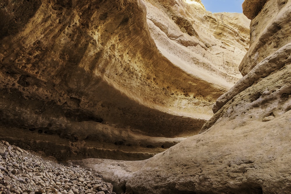 a rocky canyon with a river running through it