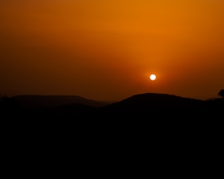A sunset view over the community with distant hills.