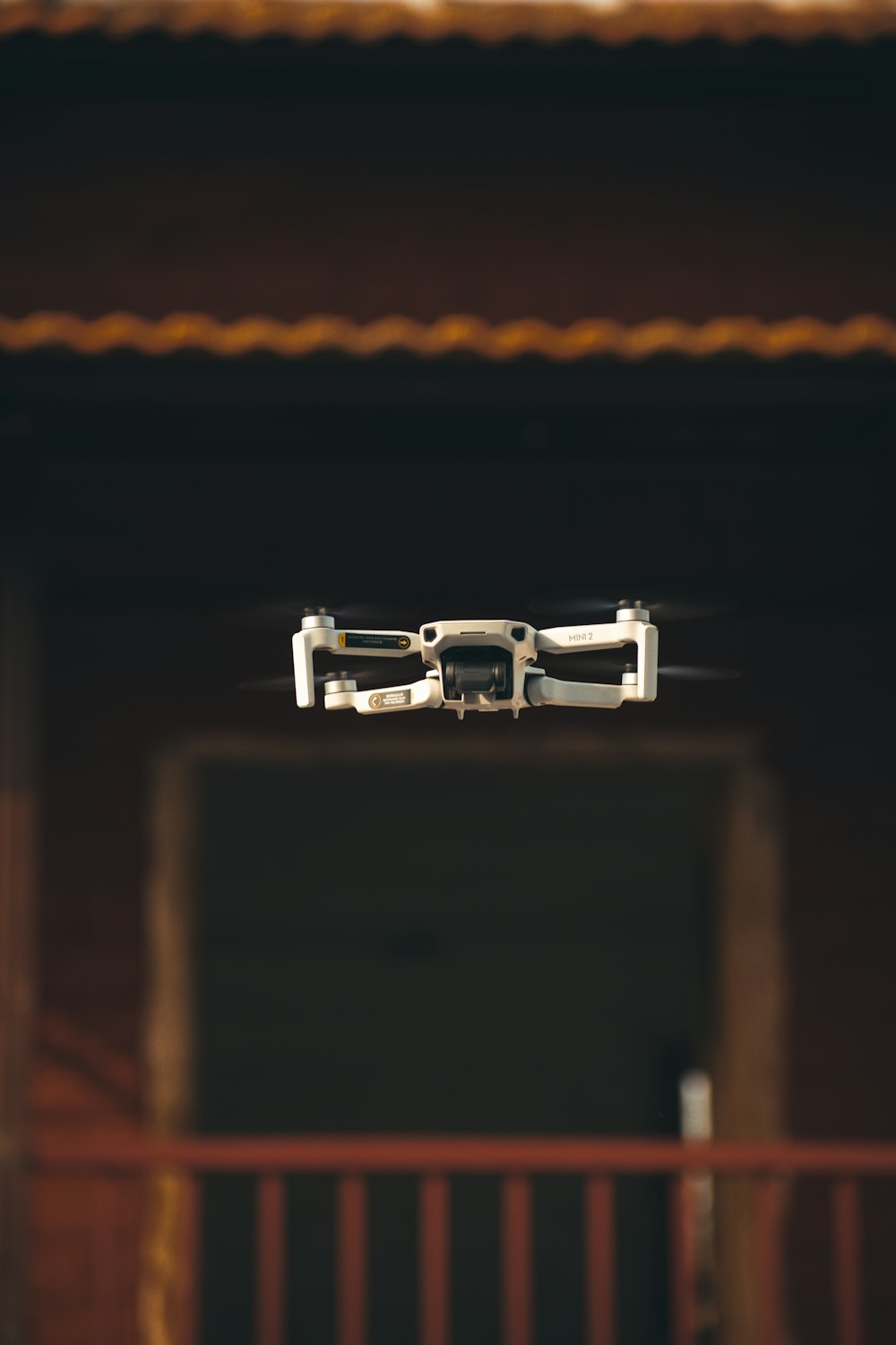 a camera on a railing