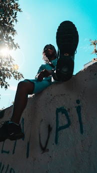 a man sitting on a rock