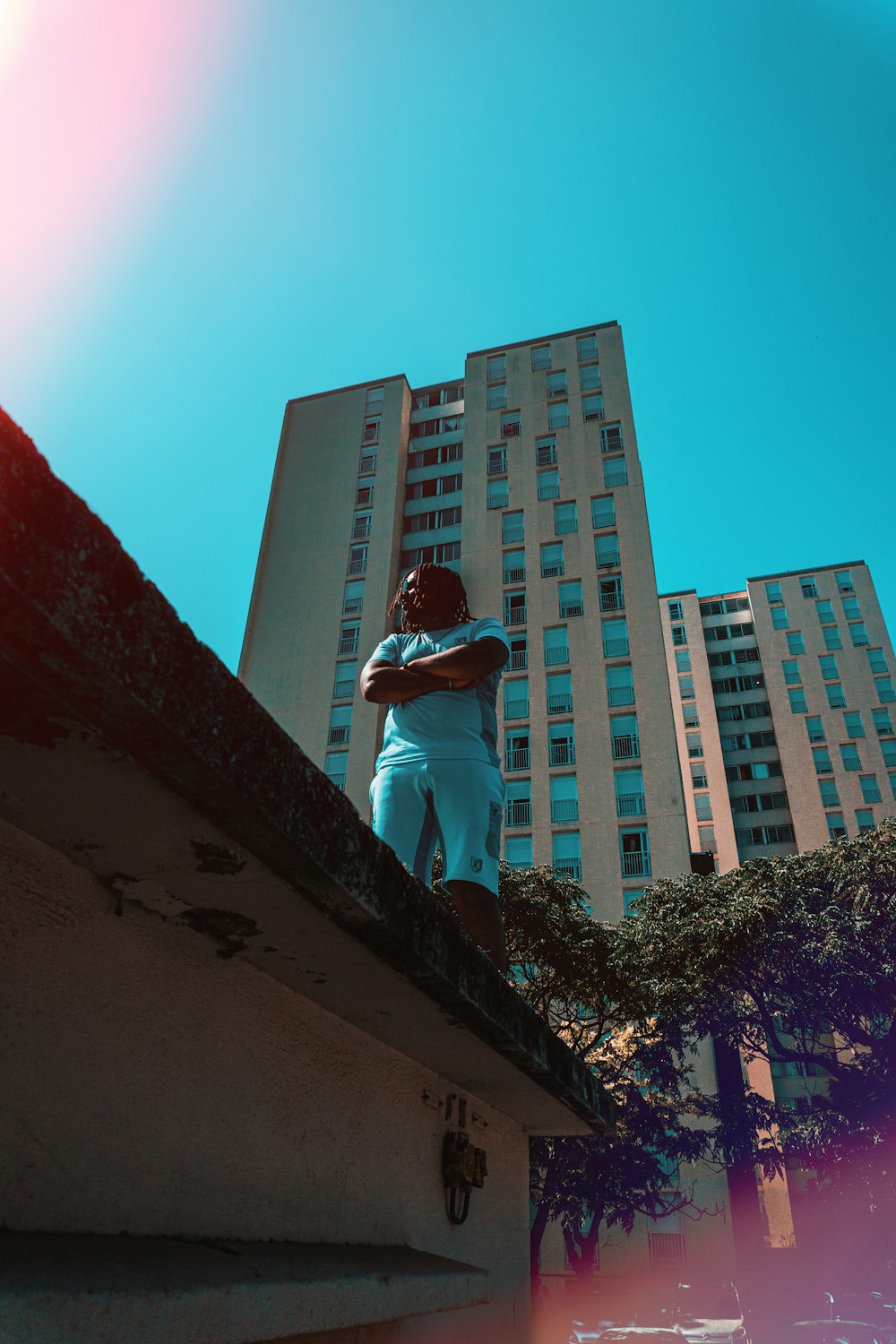 a person standing on a ledge