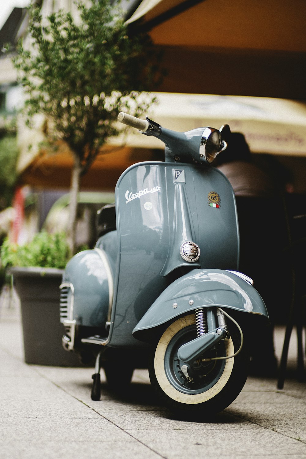 a motorcycle parked on the sidewalk