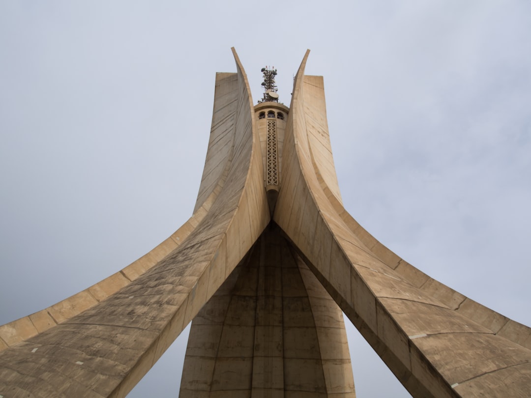 a tall building with a tower, The martyr