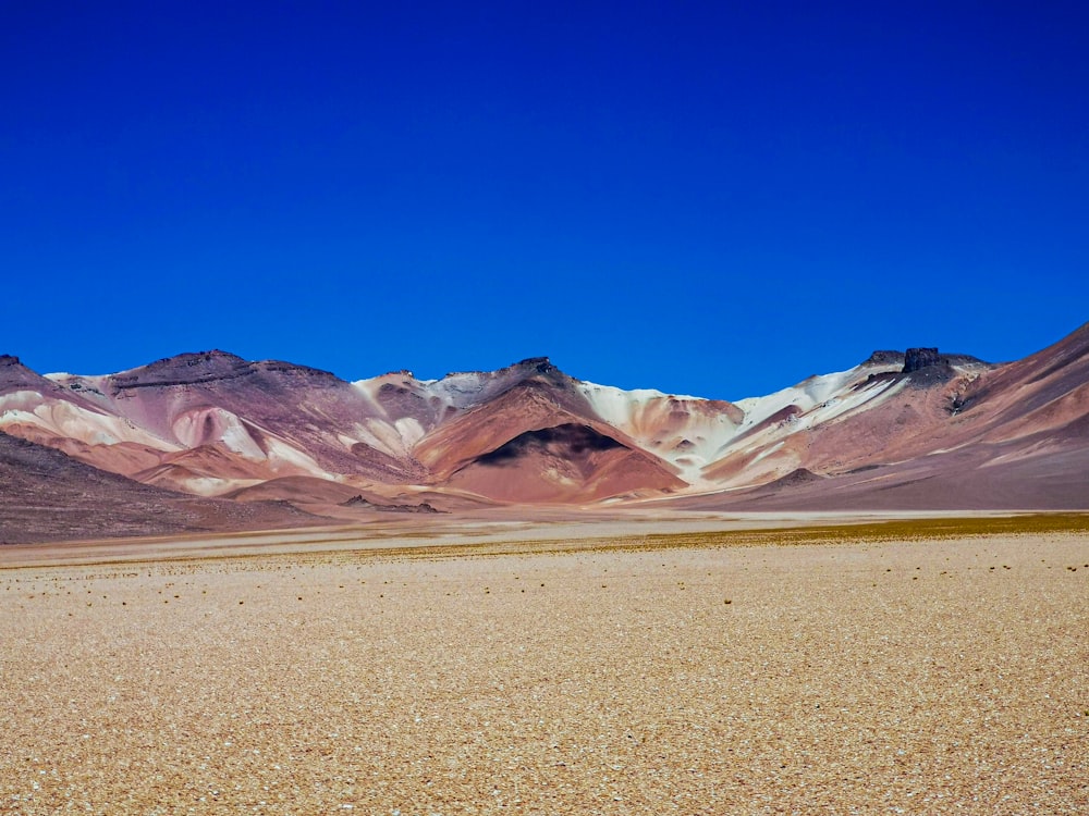 a desert landscape with mountains