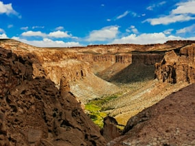 a canyon with a river running through it