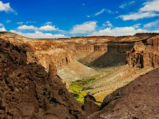 a canyon with a river running through it