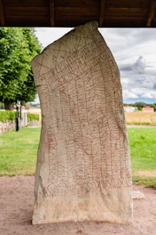 a stone sculpture of a person