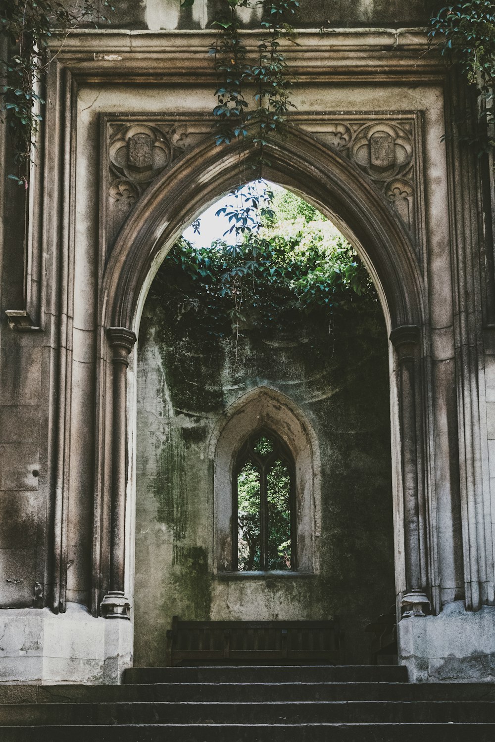 a stone building with a large arched doorway