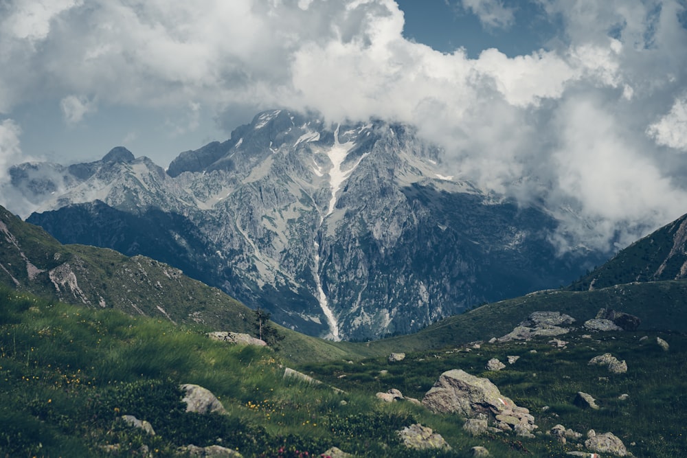 a mountain with clouds