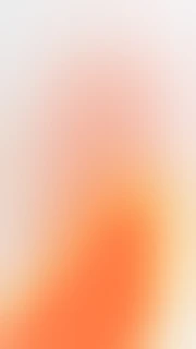 A soft gradient shifting from pale white to warm orange