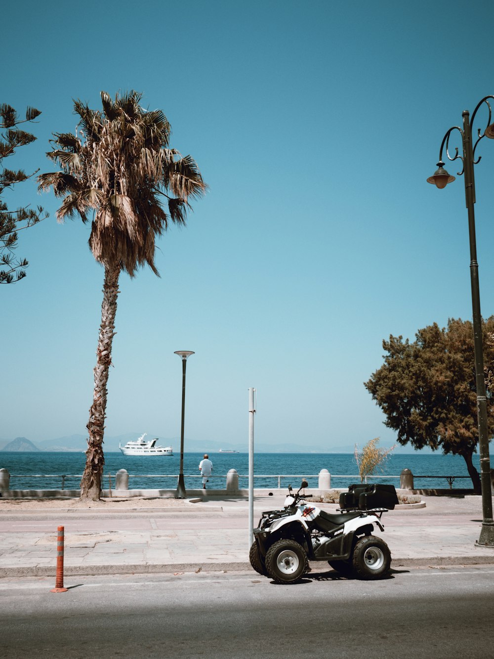 a motorcycle parked on the side of a road