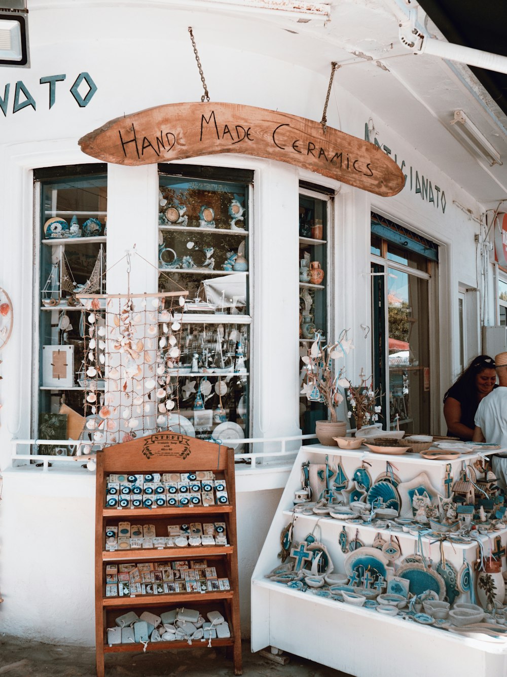 a store front with a display of chinaware