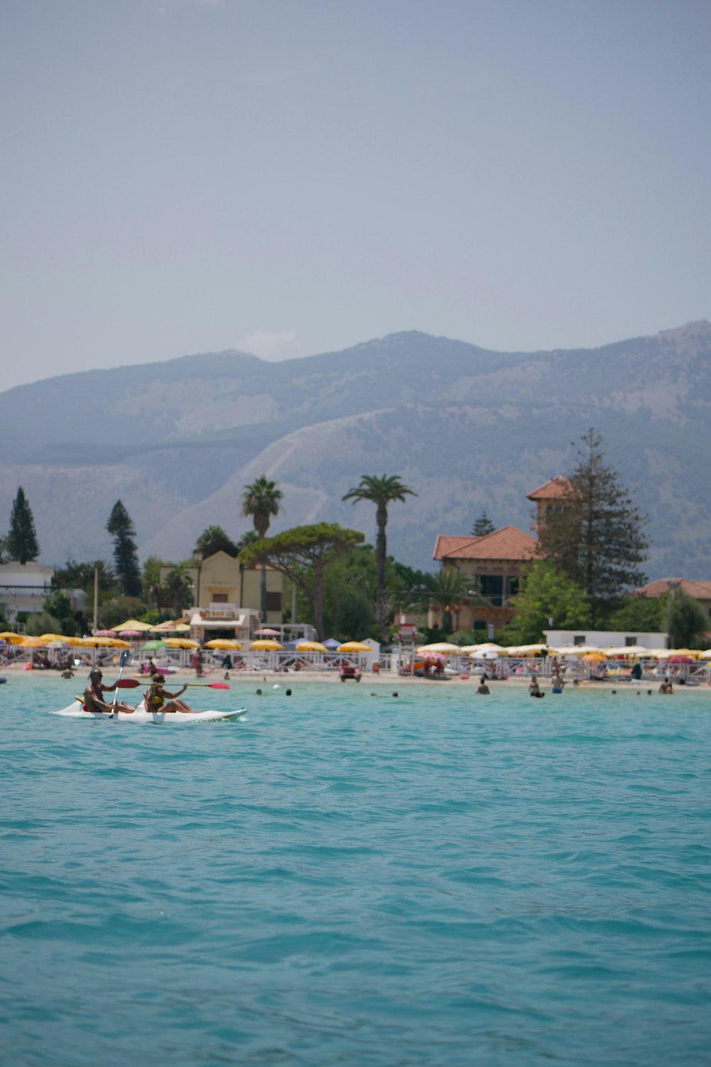 a beach with people on it