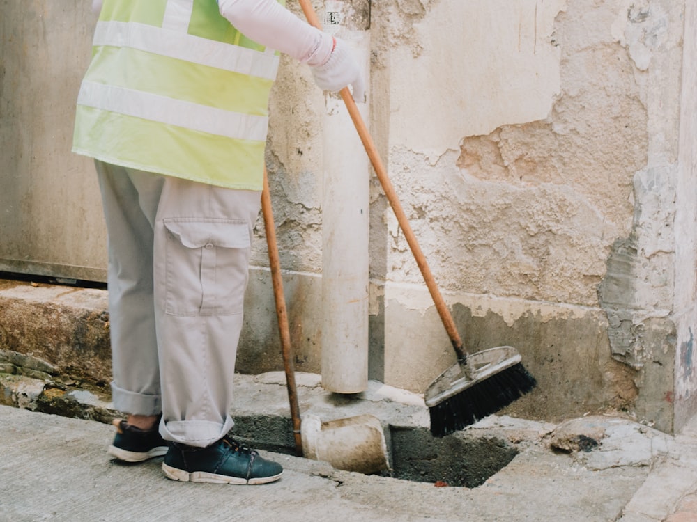 a person holding a shovel