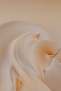 An elegant abstract design with smooth curves and soft colors.