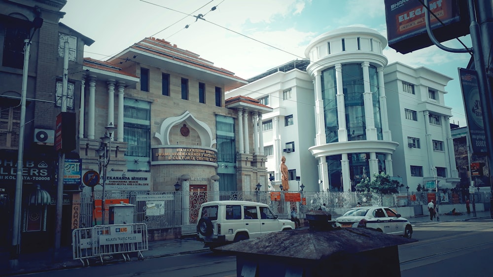 a street with cars and buildings on the side