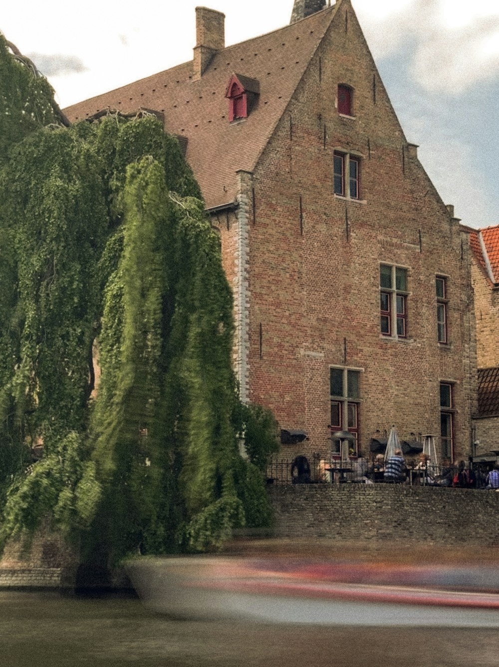 a building with a large ivy covered wall