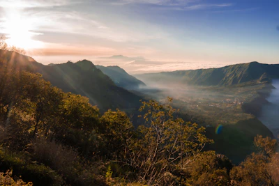 Misty hills and lush greenery of Bandarban at dawn.