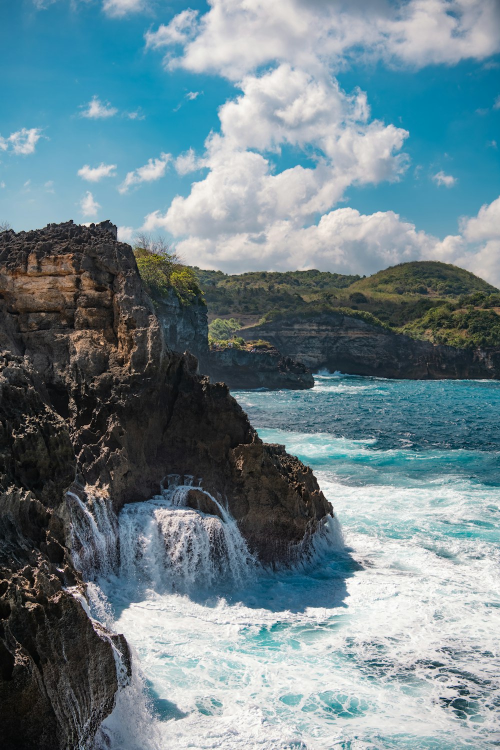 a waterfall over a cliff