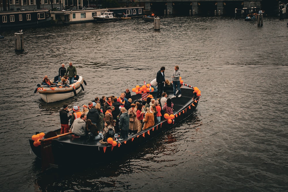 a group of people on boats