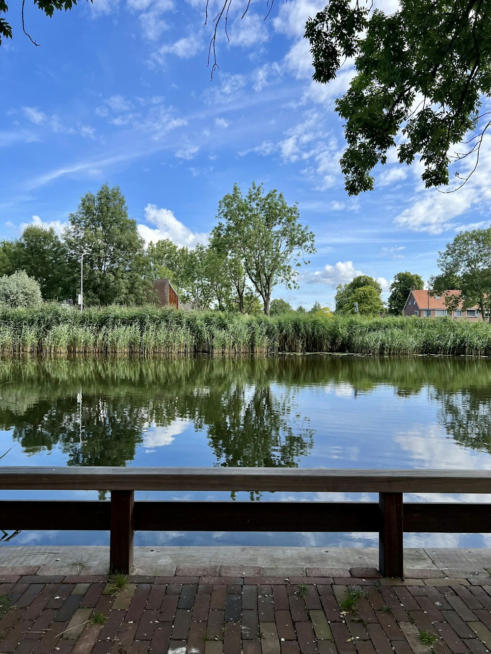 a wood deck overlooking a lake