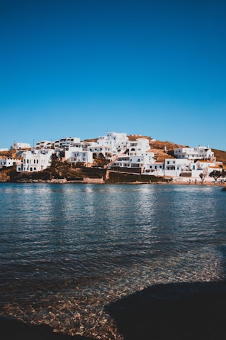 a body of water with buildings along it