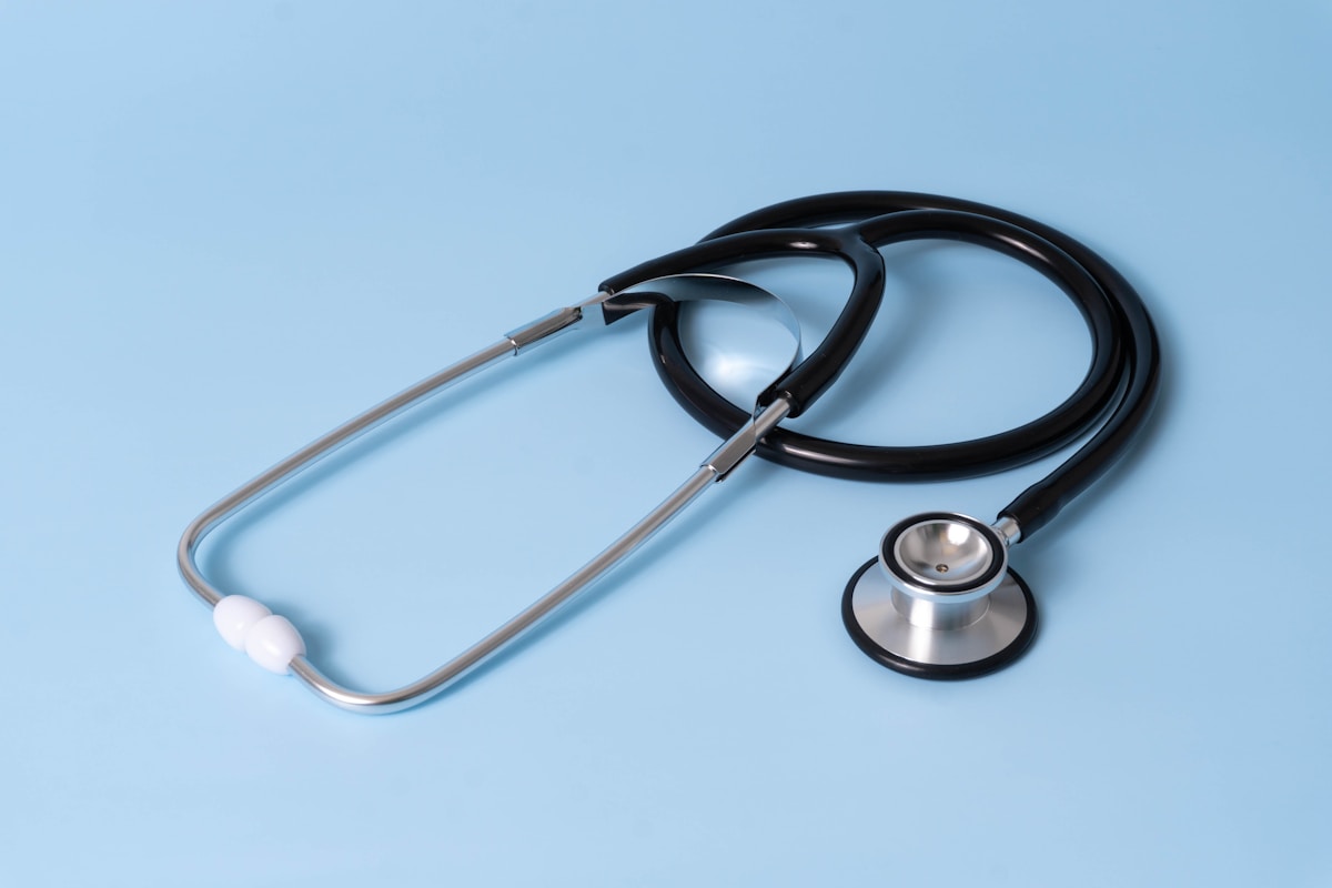 image of stethoscope and a laptop