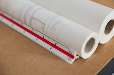 a close-up of a white tube with a red label