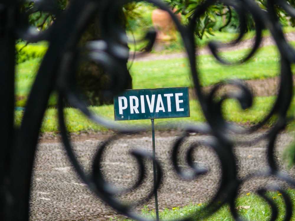 a sign on a fence