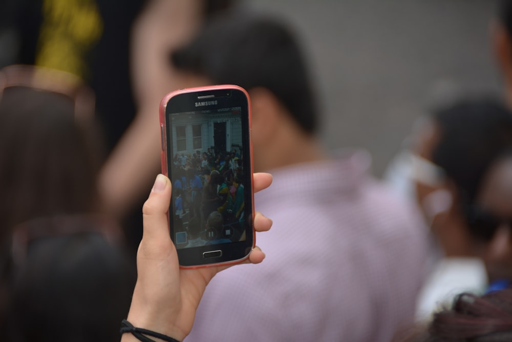 a person holding a cell phone