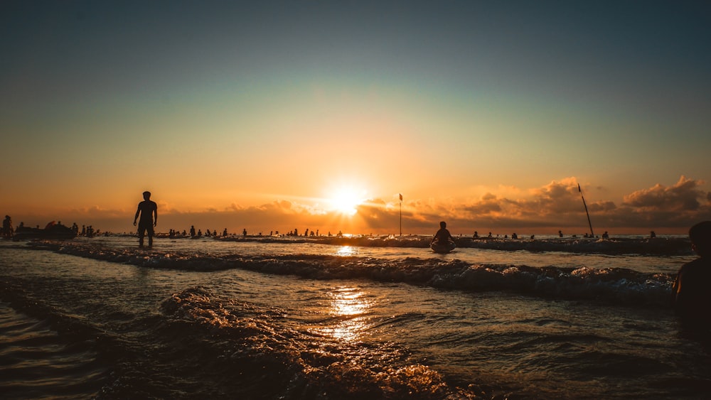 a group of people on a beach