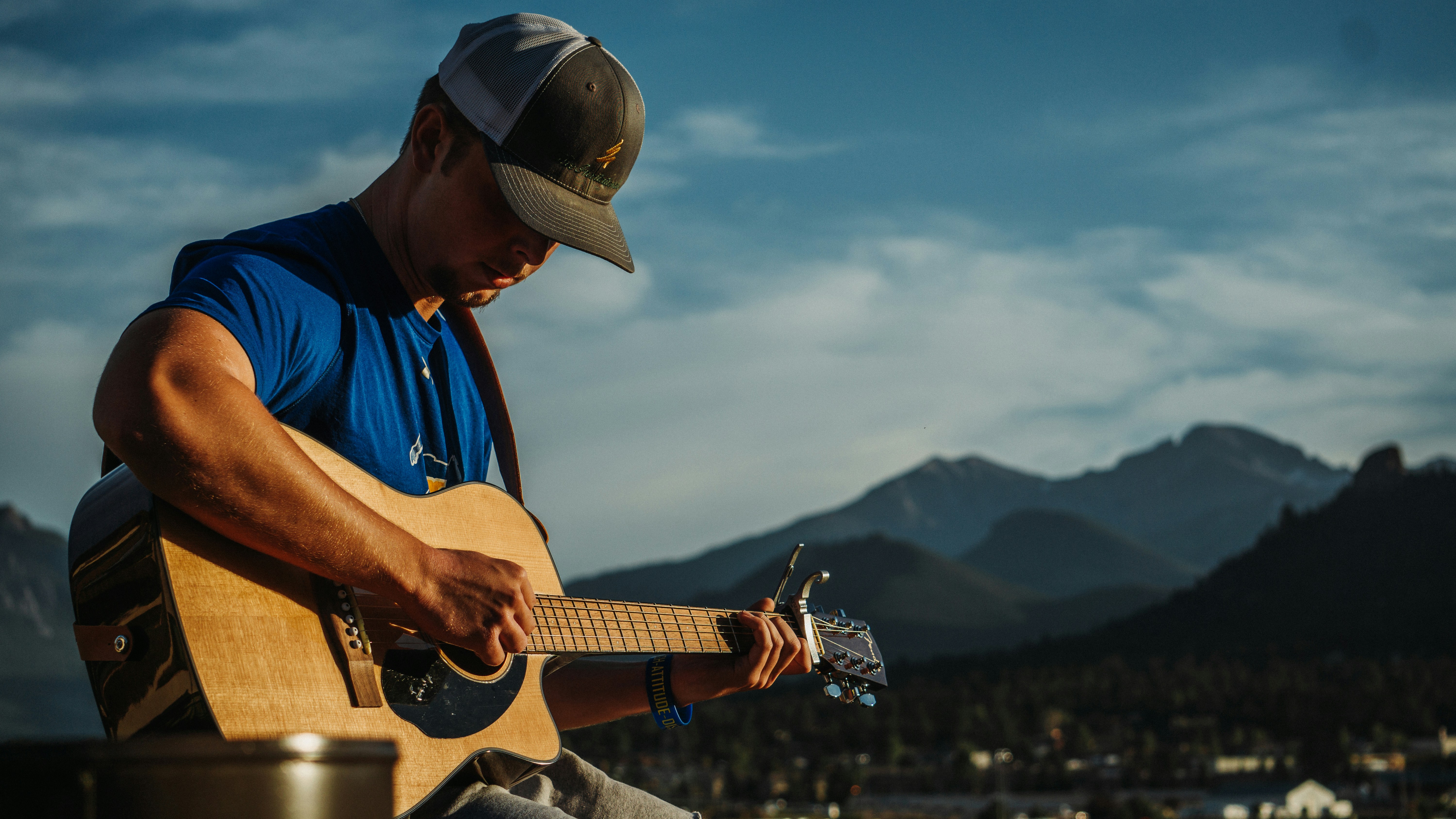 a man playing a guitar